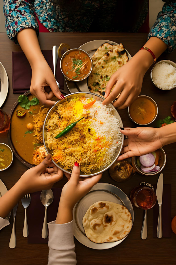 People sharing an indian meal