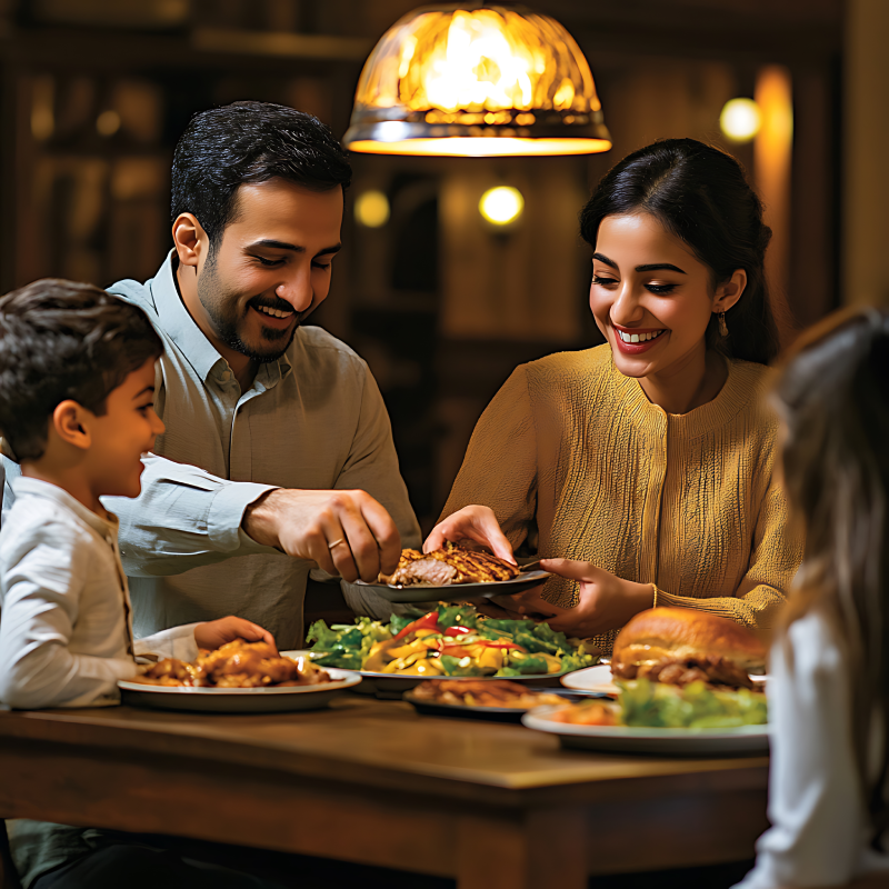 Family sits together to eat